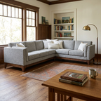 The grey sectional placed naturally in a Craftsman living room with realistic light and shadows